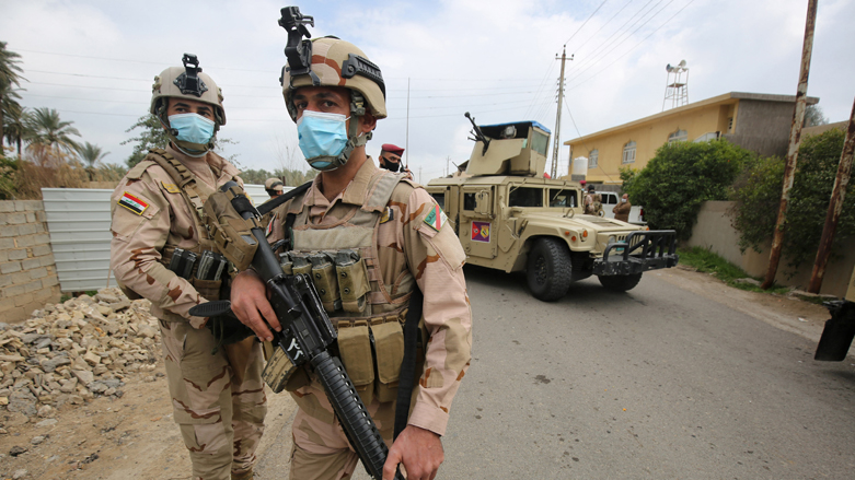 Iraqi forces search the area in Tarmiyah, 35 kilometres (20 miles) north of Baghdad, following clashes with Islamic State group fighters, February 20, 2021 (Photo: Ahmad al-Rubaye / AFP)